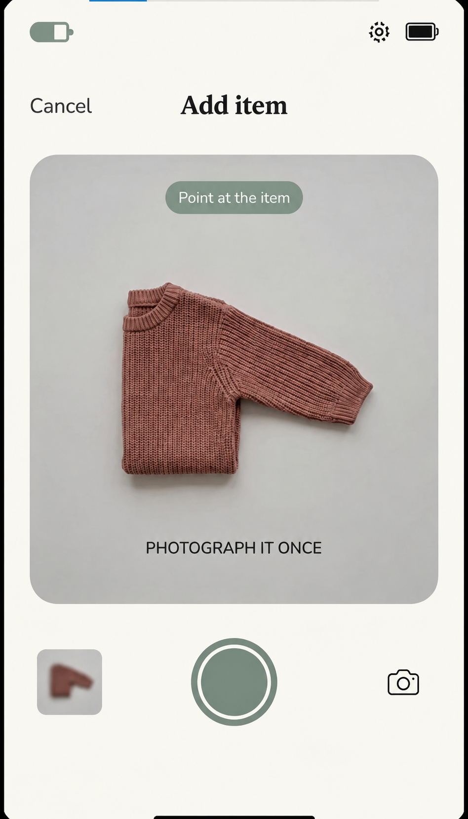 Add item camera screen with a sweater ready to photograph